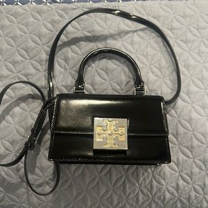 Tory Burch Black Handbag with SilverGokd Accent. Top Handle or Cross Body.
